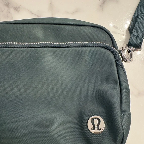 Lululemon Everywhere Crossbody Bag 2L, metal hardware, Legacy Green/Silver - Picture 2 of 8
